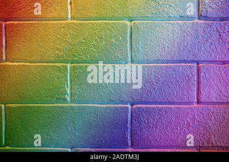 Rainbow colored brick texture closeup horizontal background. Stock Photo