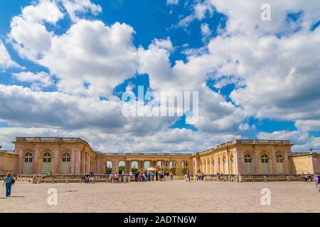 Nice panoramic view in front of the entrance of the Grand Trianon Palace in Versailles. Influenced by Italian architecture, the palace has a single... Stock Photo
