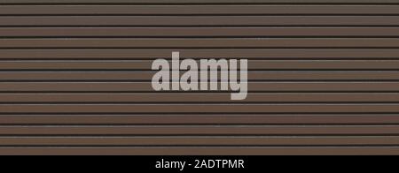 The background is dark brown wood. Stock Photo