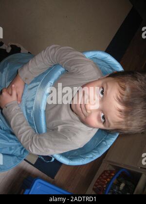 A boy portrait. Sillly face expression, wide eyes, funny lips. Stock Photo