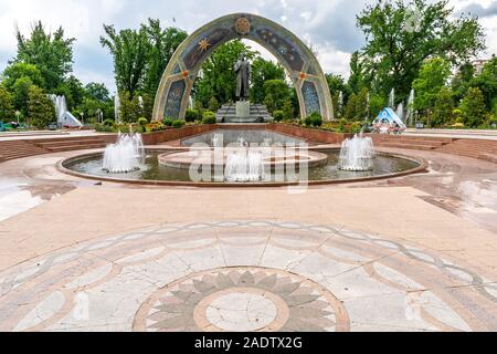 Dushanbe Abu Abdullah Rudaki Park Statue Picturesque View with Fountain on a Cloudy Rainy Day