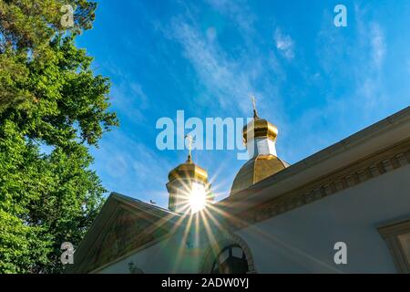 Dushanbe Russian Orthodox Christian Saint Nicholas Cathedral Picturesque View of Sun Rays on a Sunny Blue Sky Day Stock Photo