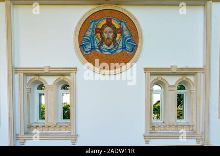 Dushanbe Russian Orthodox Christian Saint Nicholas Cathedral Picturesque View of God Jesus Christ Mosaic on a Sunny Blue Sky Day Stock Photo