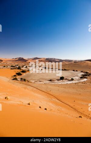 Dead lake and dune mountains, winds ripples, Sossusvlei, Namib Desert, Namib-Naukluft National Park, Namibia, Southern Africa, Africa Stock Photo
