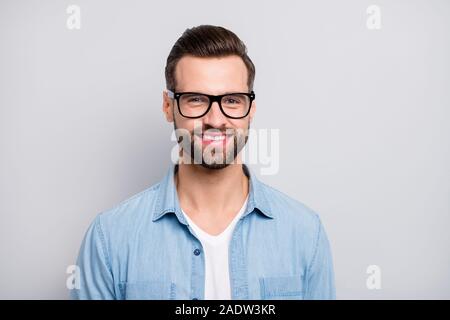 Closeup photo of amazing friendly business guy perfect neat appearance hairstyle young promoted boss chief wear specs casual denim outfit isolated Stock Photo