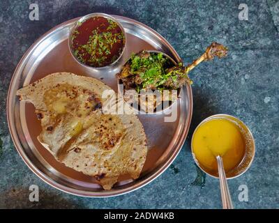 Mutton thali with gravy and roti, India Stock Photo