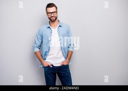 Photo of amazing macho guy perfect appearance neat hairstyle bristle young promoted boss chief easy-going person wear casual denim outfit isolated Stock Photo