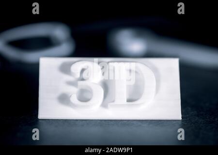 Sign with letters or 3D text is or was printed, concept modern technology 3D printer Stock Photo