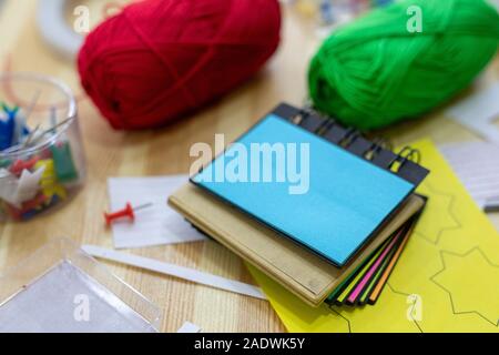 Materials for preparing for agile or scrum planning, filling in a kanban board or task board. stickers, pins, threads Stock Photo