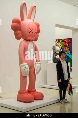 Accomplice by Brian Donnelly aka KAWS sculptor and graffiti artist exhibition at National Gallery of Victoria NGV Melbourne Australia. Stock Photo