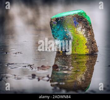 rock with paint in abandoned industry site Stock Photo