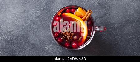 Mulled red wine with spices. Traditional Christmas drink. Slate background. Copy space. Top view Stock Photo
