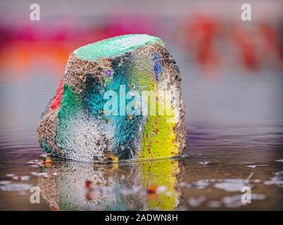 rock with paint in abandoned industry site Stock Photo
