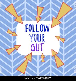 Word writing text Follow Your Gut. Business photo showcasing Listen to intuition feelings emotions conscious perception Asymmetrical uneven shaped for Stock Photo