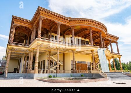 Khujand Arbob Cultural Palace Huge Traditional Tajik Oshkhona Restaurant View with Fountain on a Sunny Blue Sky Day Stock Photo
