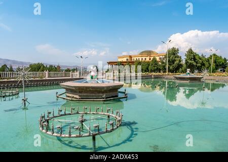Khujand Arbob Cultural Palace Picturesque Breathtaking View of a Fountain on a Sunny Blue Sky Day Stock Photo