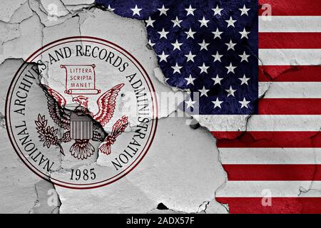 flags of National Archives and Records Administration and USA painted on cracked wall Stock Photo