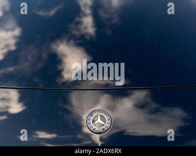 Mercedes Benz badge symbol on a car bonnet Stock Photo