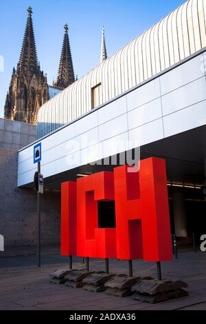 red letters symbolize the word ICH ( I ), Kurt-Hackenberg square, the Museum Ludwig, the cathedral, Cologne, Germany.  rote Buchstaben stellen das Wor Stock Photo