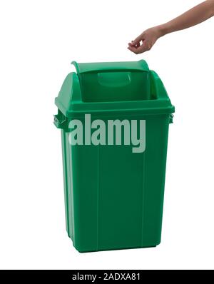 woman hand throwing something into the trash can isolated on white background Stock Photo