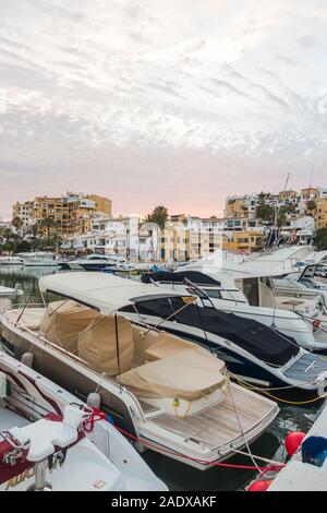 Yachts moored in luxury style marina of Cabopino, Andalusia, Spain. Stock Photo