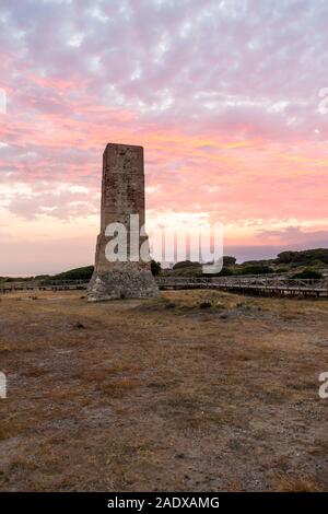 Moorish lookout tower, Thieves Tower, at beach Cabopino near Marbella, at sunset, Andalusia, Spain. Stock Photo