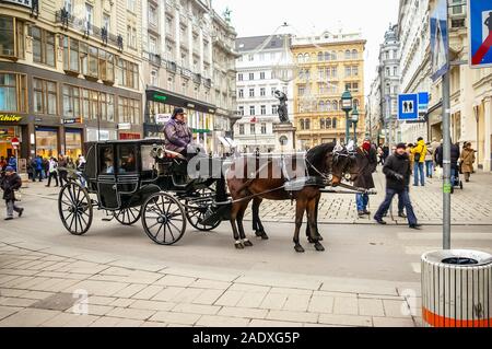 Two horses harnessed to the carriage,  Vienna, Austria Stock Photo