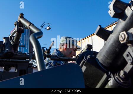 Antiaerial weapon. Soldier and anti-aircraft gun Stock Photo