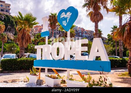 Tropea, Calabria, Italy - September 07, 2019: Outdoor decorated street sigh that says I love Tropea located on main sea promenade in front of the main