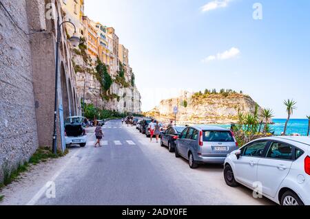 Rotonda Beach, Tropea, Calabria, Italy - September 07, 2019: Famous sea promenade in Tropea with high cliffs with built on top city buildings and Tyrr