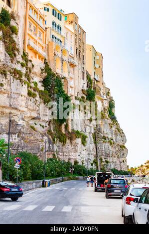 Tropea, Calabria, Italy - September 07, 2019: Famous sea promenade in Tropea with high cliffs with built on top city buildings and apartments. Parking