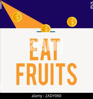 Writing note showing Eat Fruits. Business concept for consume any product of plant growth useful to huanalysiss or animals Three gold spherical coins Stock Photo