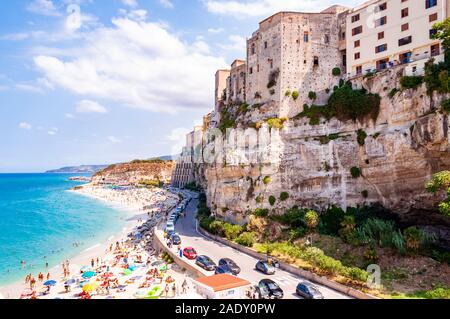 Tropea, Calabria, Italy - September 07, 2019: Sea promenade scenery in Tropea with high cliffs with built on top city buildings and apartments. Rotond Stock Photo