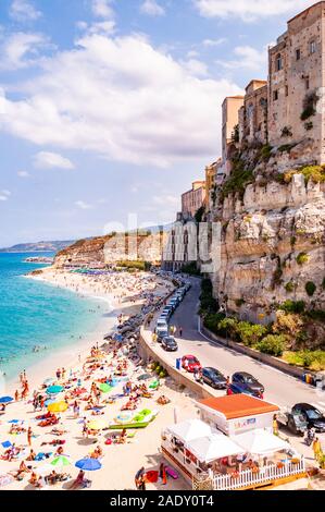 Tropea, Calabria, Italy - September 07, 2019: Sea promenade scenery in Tropea with high cliffs with built on top city buildings and apartments. Rotond Stock Photo