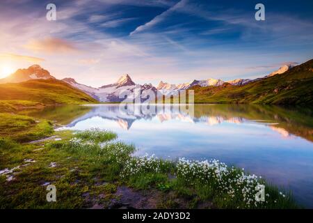 Great view of Mt. Schreckhorn and Wetterhorn above Bachalpsee lake. Dramatic and picturesque scene. Popular tourist attraction. Location place Swiss a Stock Photo