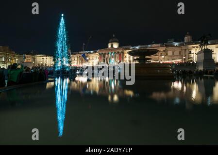 London, UK.  5 December 2019.  The annual lighting of the Christmas Tree takes place in Trafalgar Square.  The tree, a Norwegian spruce, is donated by the City of Oslo to the people of London each year as a token of gratitude for Britain’s support during the Second World War.  This year, the tree has been criticised for having branches which look too sparse. Credit: Stephen Chung / Alamy Live News