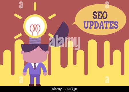 Word writing text Seo Updates. Business photo showcasing new information or design in search engine optimization Standing successful man suit necktie Stock Photo
