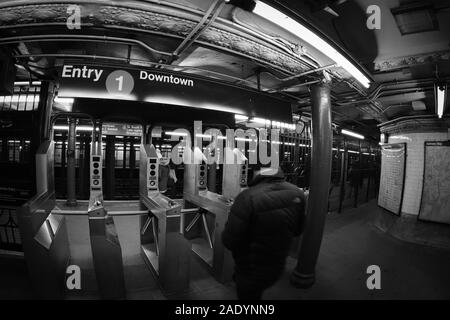 New York City, NY - Novermber 18, 2019: Unidentified person entering the Line 1 subway in Manhattan New York City, NY