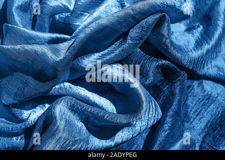 Blue color 2020 inscription. Blue silk textures. Gift concept. Stock Photo
