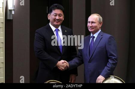 Sochi, Russia. 05 December, 2019. Russian President Vladimir Putin, right, welcomes Mongolian Prime Minister Ukhnaagiin Khurelsukh for a bilateral meeting at the Residence at Cape Idokopas December 5, 2019 in Sochi, Russia.  Credit: Mikhael Klimentyev/Kremlin Pool/Alamy Live News Stock Photo