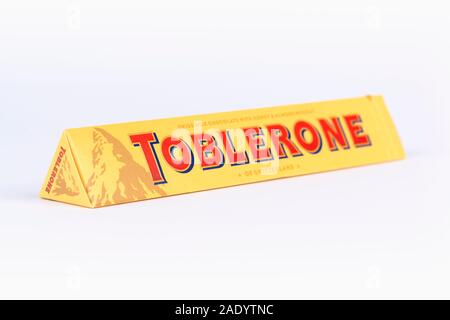 A Toblerone chocolate bar in a box shot on a white background. Stock Photo