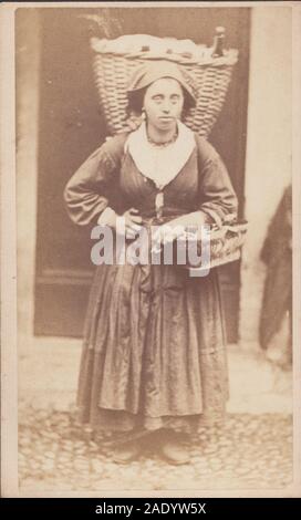 Victorian CDV (Carte De Visite) Showing a Market Woman Carrying Her Wicker Baskets. Stock Photo