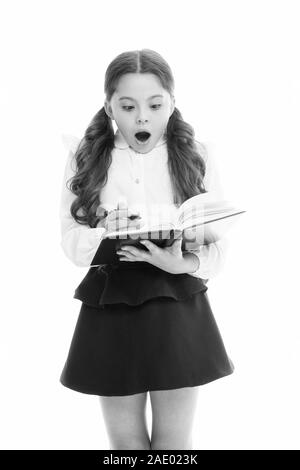 Made mistake. Focused on education. Kid girl student study. Study in primary school. Private lesson. Adorable child schoolgirl. Formal education concept. School education basics. Shocking failure. Stock Photo