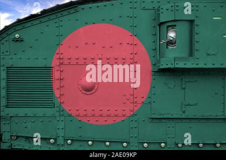 Bangladesh flag depicted on side part of military armored tank close up. Army forces conceptual background Stock Photo