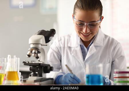 Beautiful woman in white medical gown Stock Photo