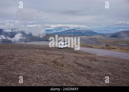 Mountain bike adventure on the flanks of Cotopaxi volcano, Cotopaxi Natioanal Park, Ecuador Stock Photo