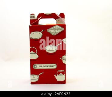 Alberton, South Africa - a red Le Creuset gift box isolated on a clear background image in horizontal format with copy space Stock Photo
