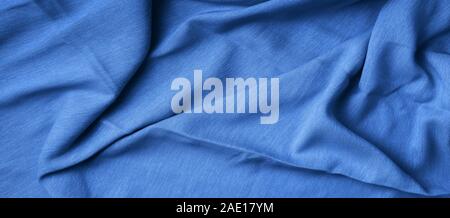 Fabric texture background in mint color. Trendy green and turquoise color. Top View of cloth textile surface. Abstract backdrop for design. Stock Photo