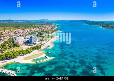 Touristic resorts in town of Vodice, amazing turquoise coastline on Adriatic coast, aerial view, Croatia Stock Photo