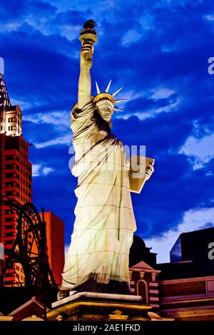 Las Vegas Strip in Paradise, Nevada, USA: 2011. low angle view of Replica of Statue of Liberty in Las Vegas during cloudy dusk sky, New York-New York Stock Photo